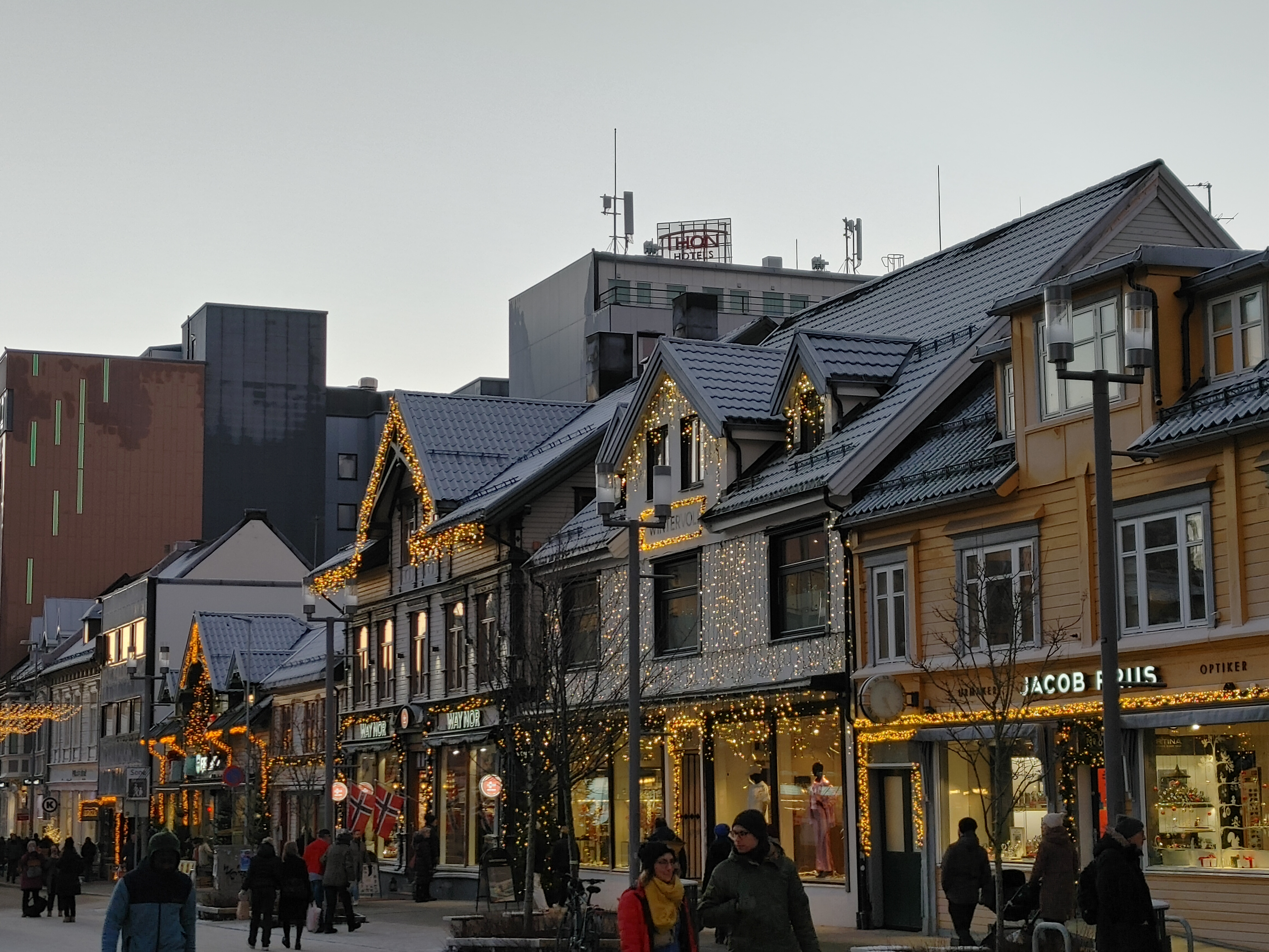 Winter in Tromso, Norway. Photo of downtown, Tromso Norway. The buildings are decorated with lights.